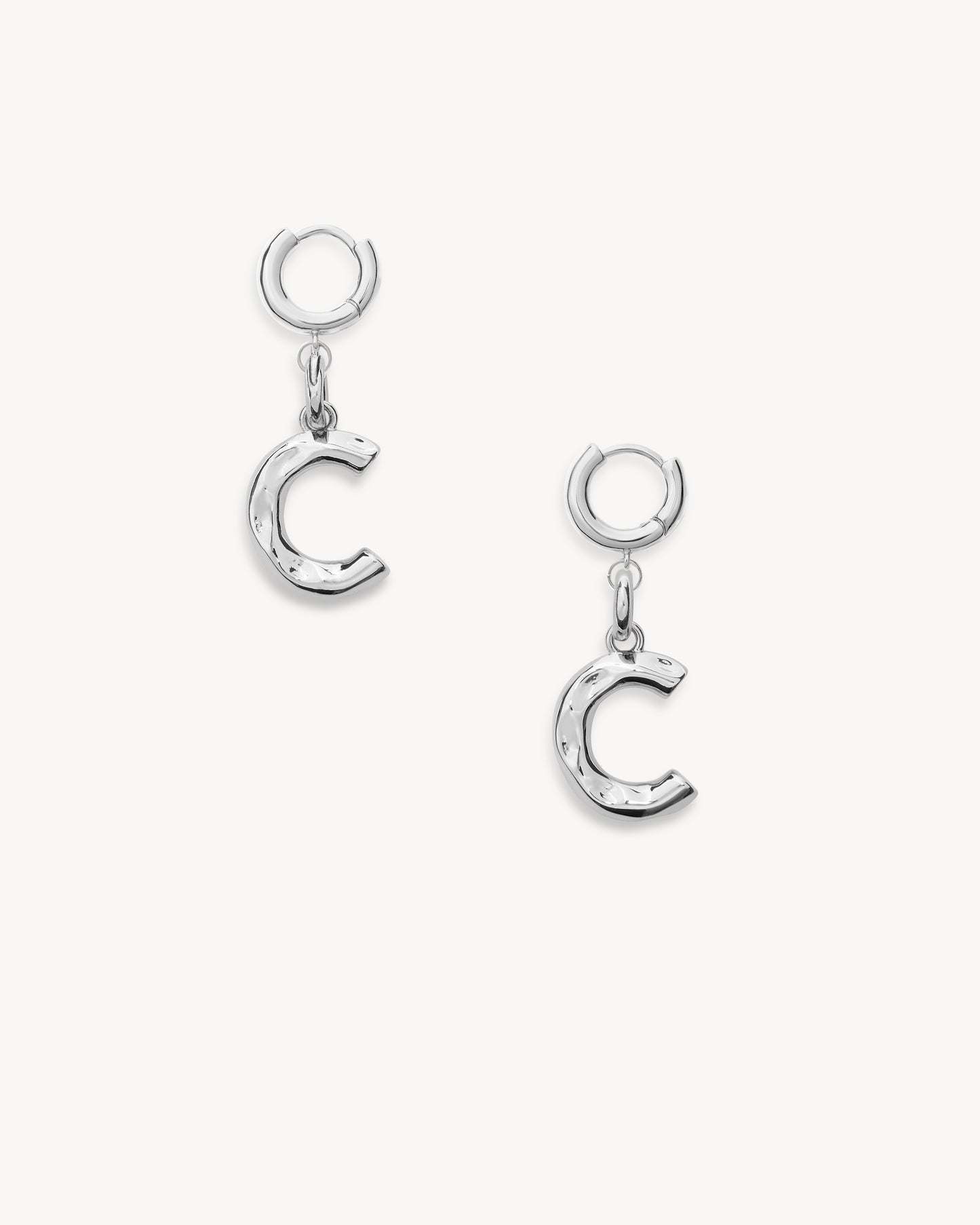 Monogram Huggie in Silver