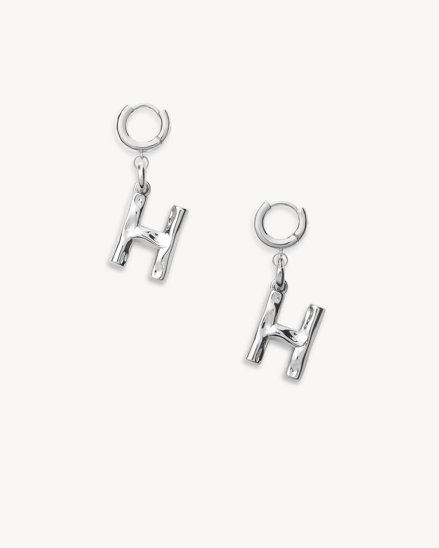 Monogram Huggie in Silver