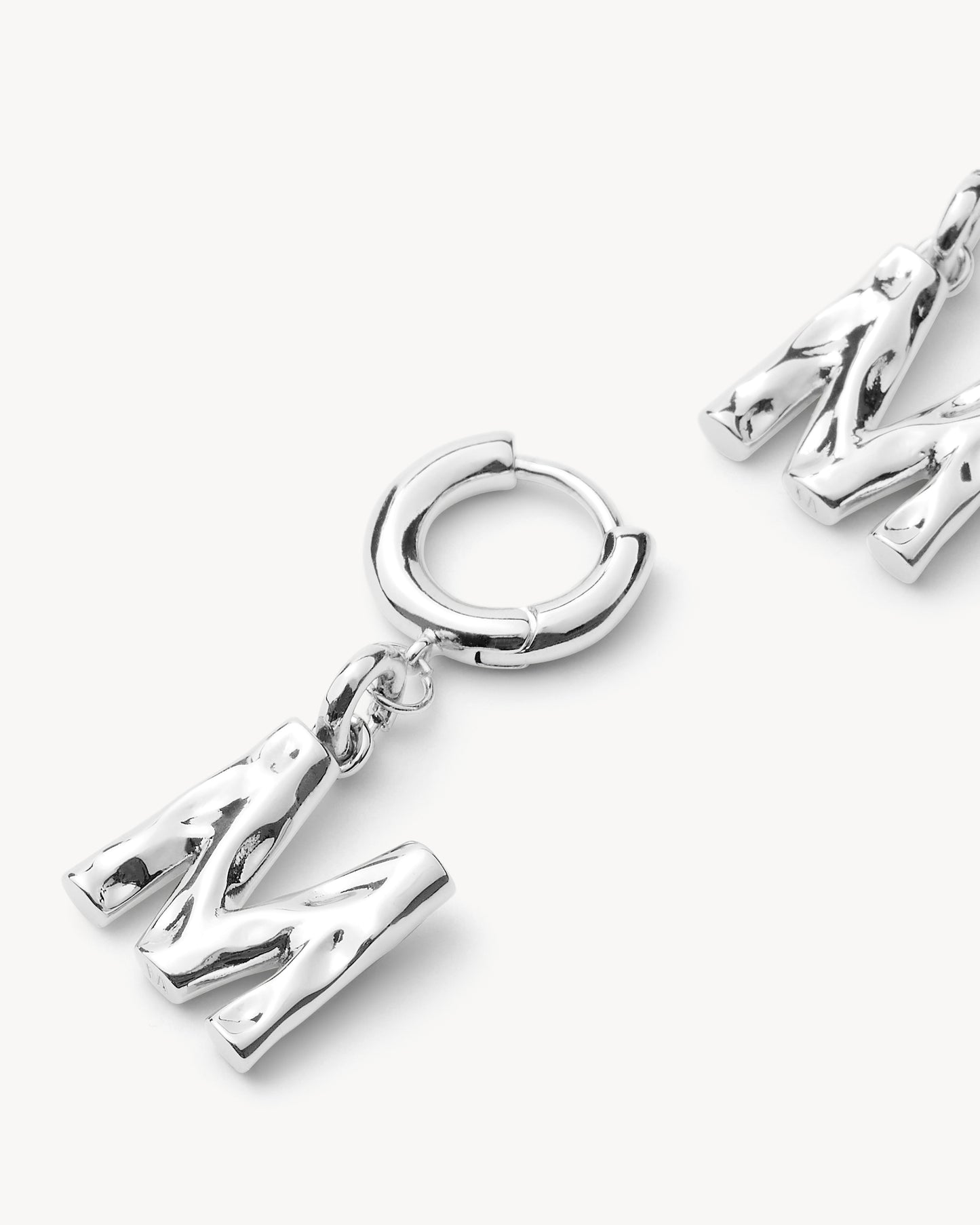 Monogram Huggie in Silver
