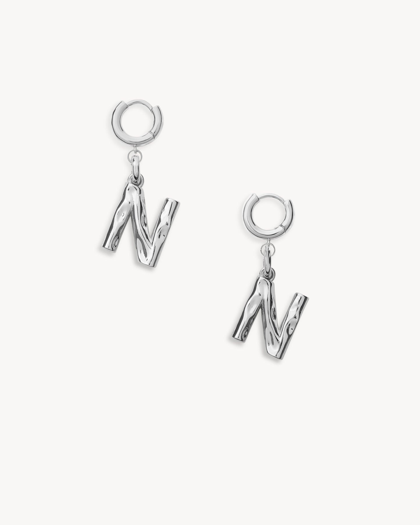 Monogram Huggie in Silver