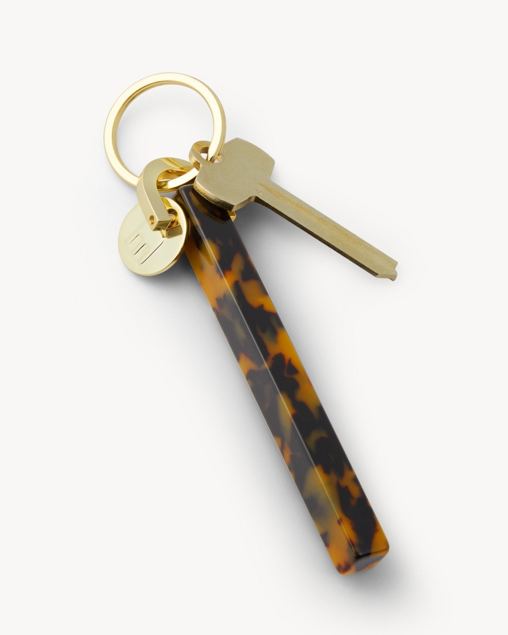 Machete keychain with classic tortoise acetate bar. MACHETE