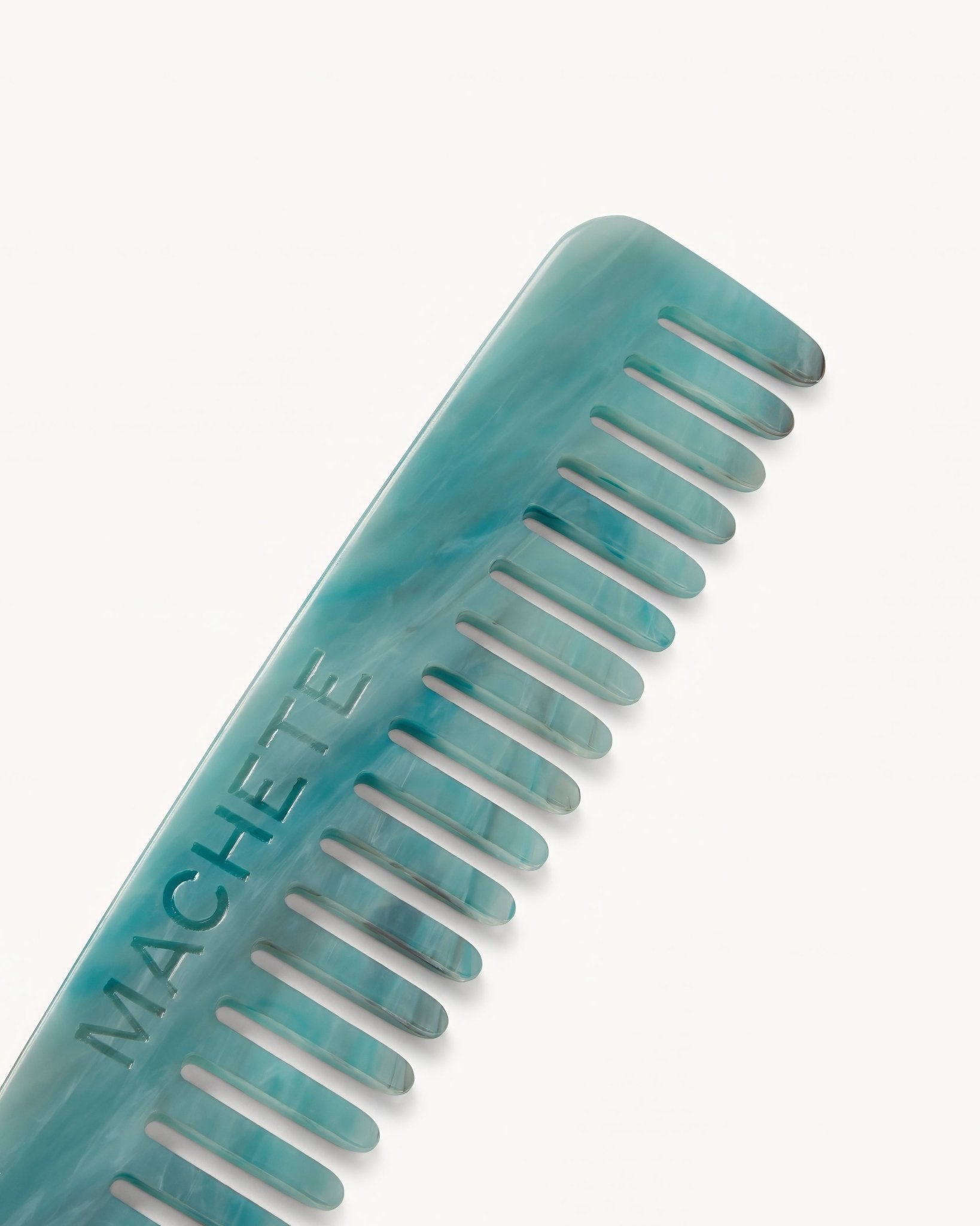 No. 3 travel-sized wide-tooth comb in Jadeite cream acetate. – MACHETE